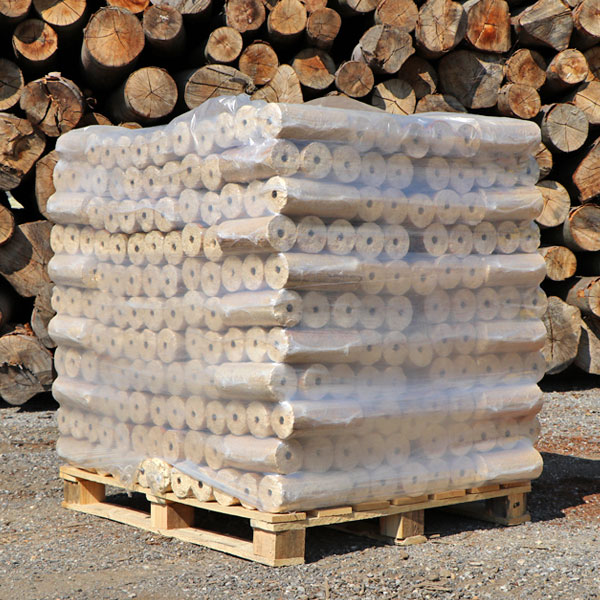 holzbriketts_rund_loch_palette.jpg Kaminanzünder aus Holzwolle – 100 Stück – Image 1